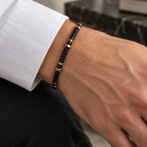 Pulseira de ônix e hematita dourada